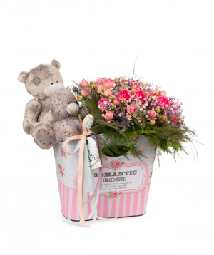 Composition `Enns` with soft toys and flowers