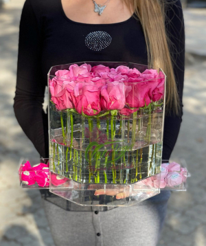 Arrangement `Sumy` with roses and sweets