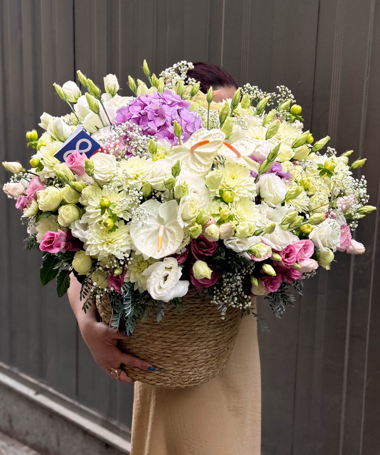 Composition «Hvidovre» with anthurium and spray roses