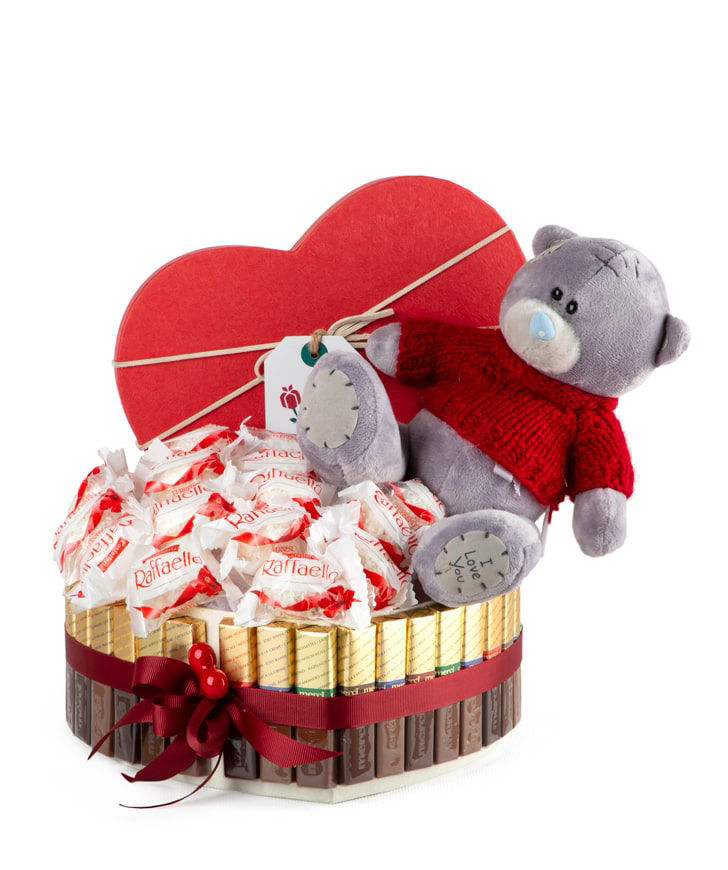 Composition `Ceccano` with a soft toy and chocolates