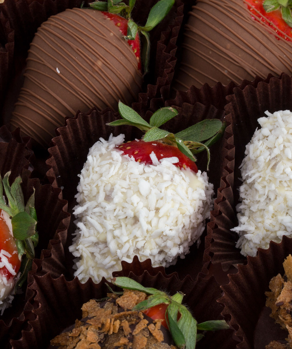 Strawberry `Theobroma` in chocolate with different flavors
