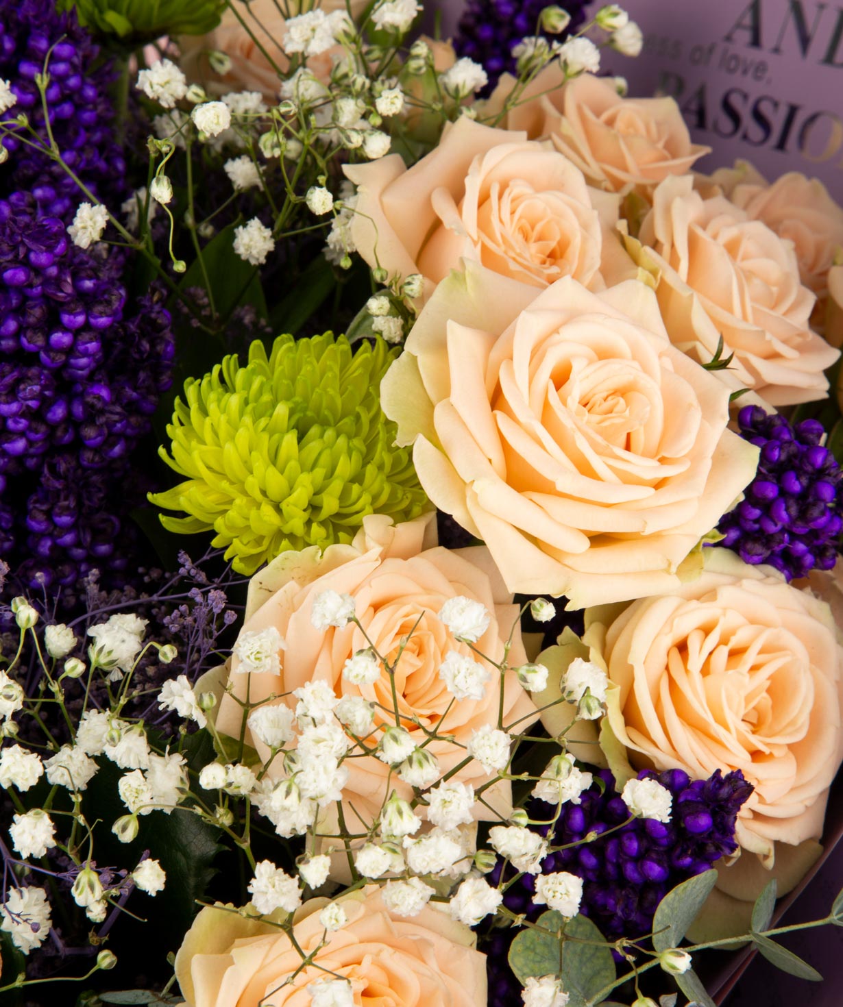 Bouquet `Lusaka` with roses, chrysanthemums, gypsophilas