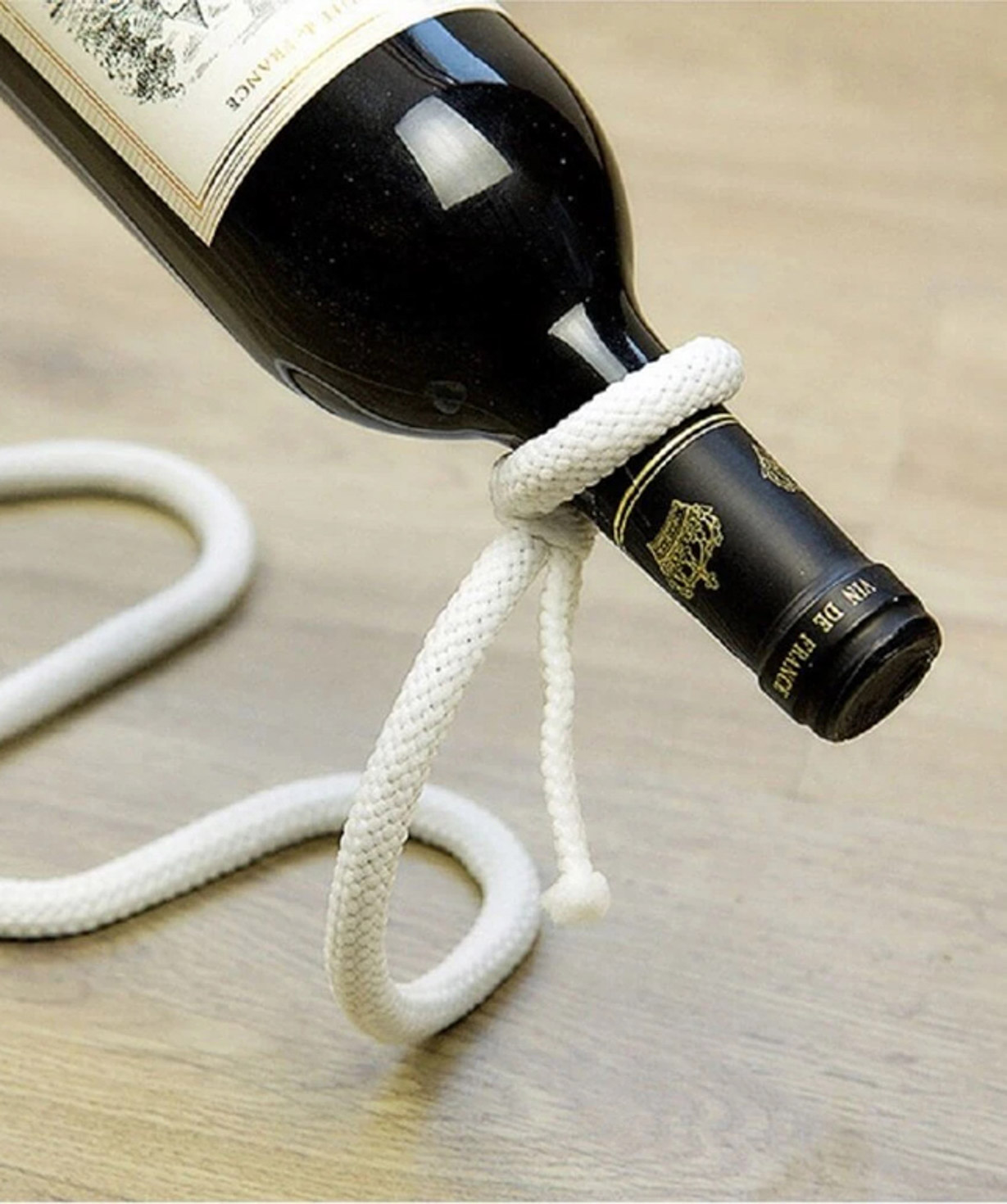 Holder `Creative Gifts` for wine bottle mysterious