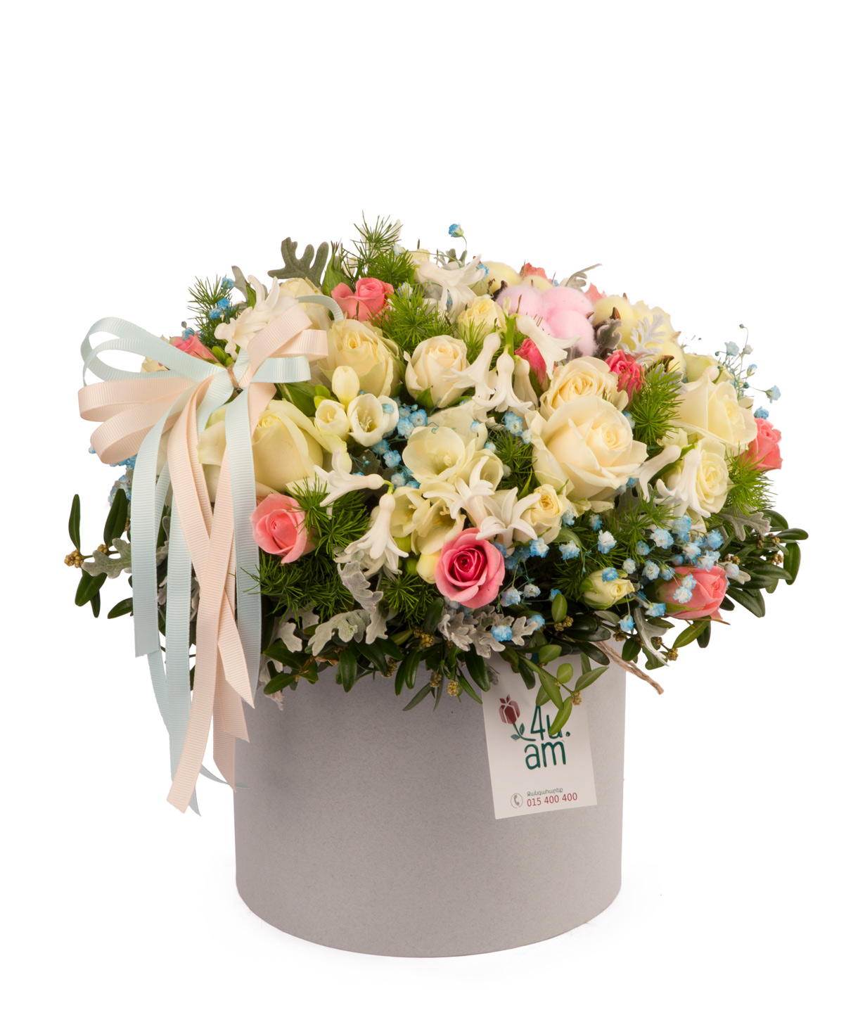 Composition `Taurage` with roses and freesias