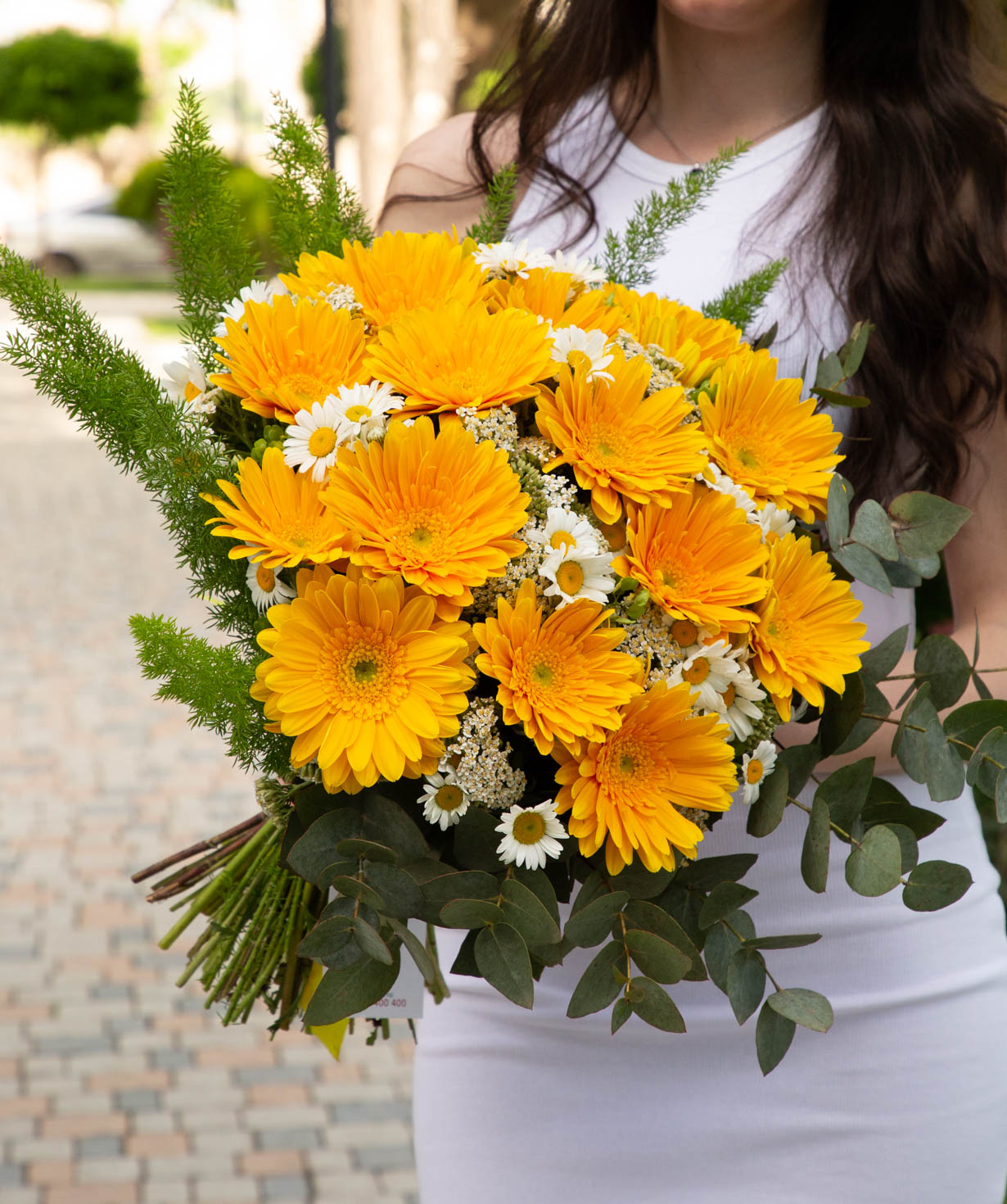 Bouquet `Afak` with gerberas and chamomiles