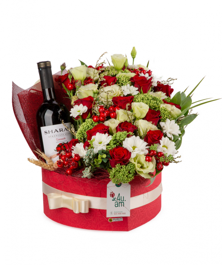 Композиция `Петергов` с цветами и бутилкой вина