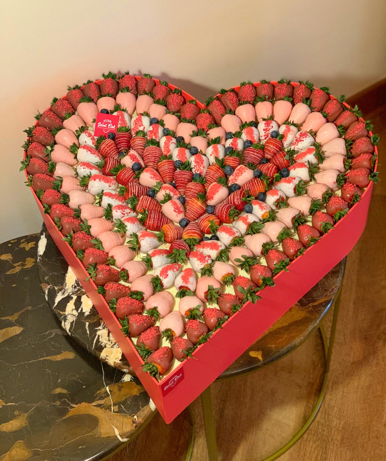 Heart-shaped composition `Sweet Elak` with chocolate covered strawberries