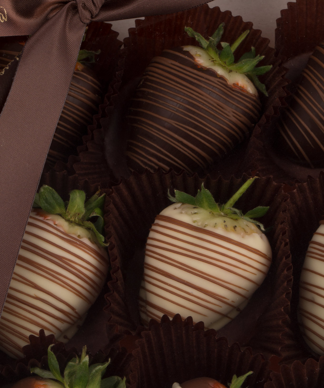 Strawberry `Theobroma` in chocolate handmade