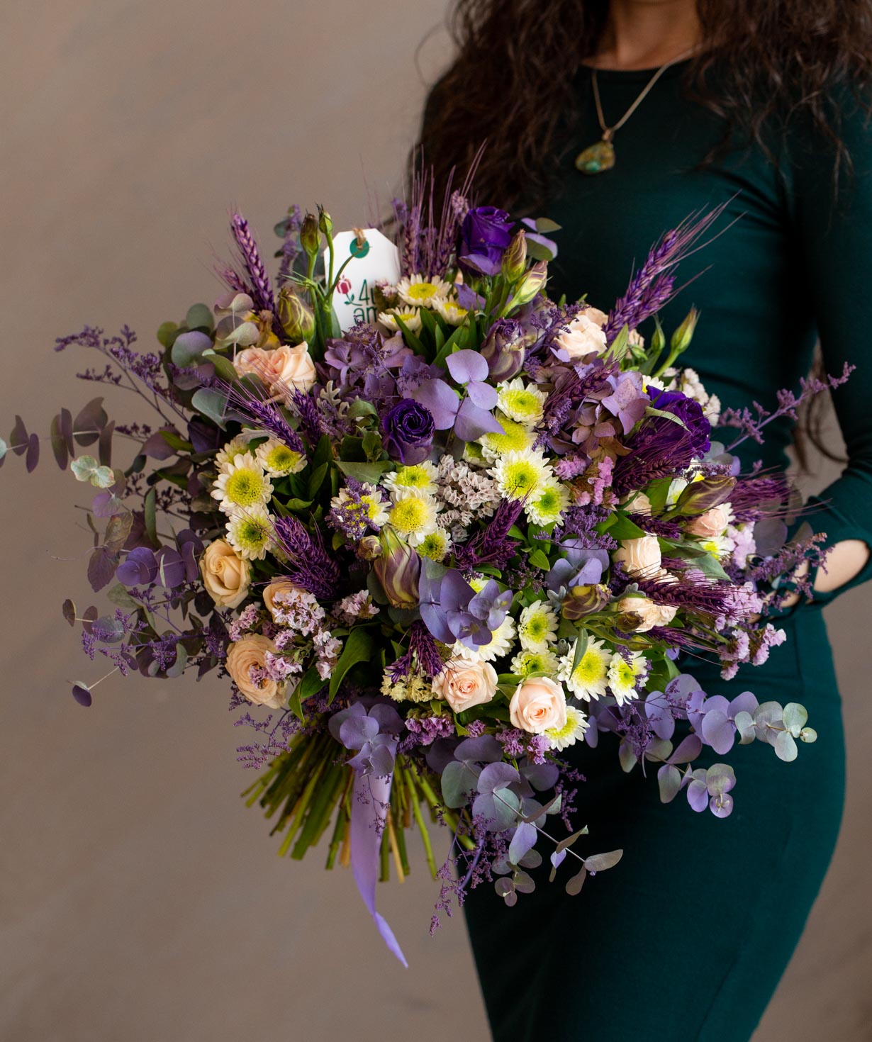 Bouquet `Banff` with roses, lisianthus and chrysanthemums