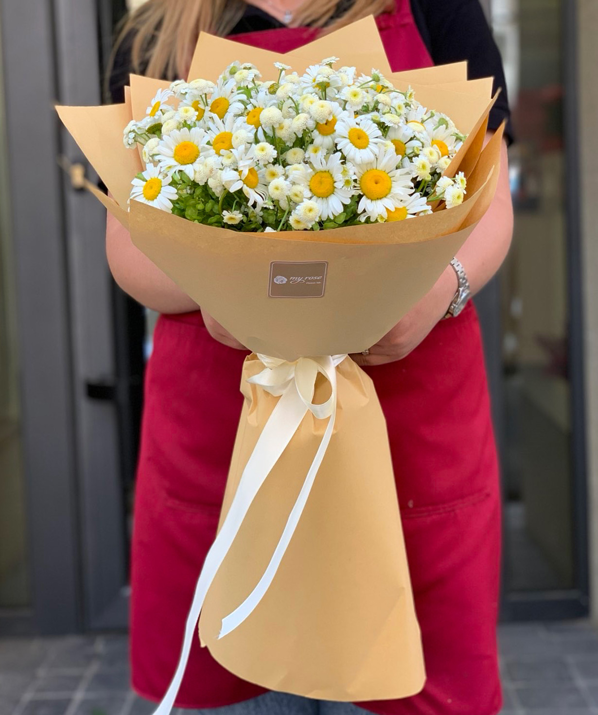 Bouquet of `Masarete` with chamomiles and chrysanthemums