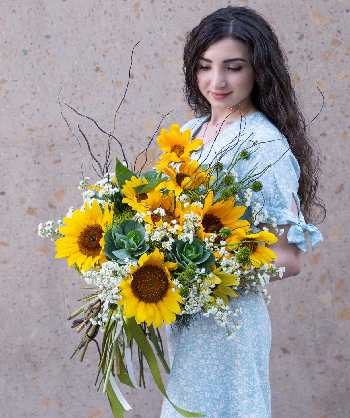Bouquet `Golway` with sunflowers and chamomiles