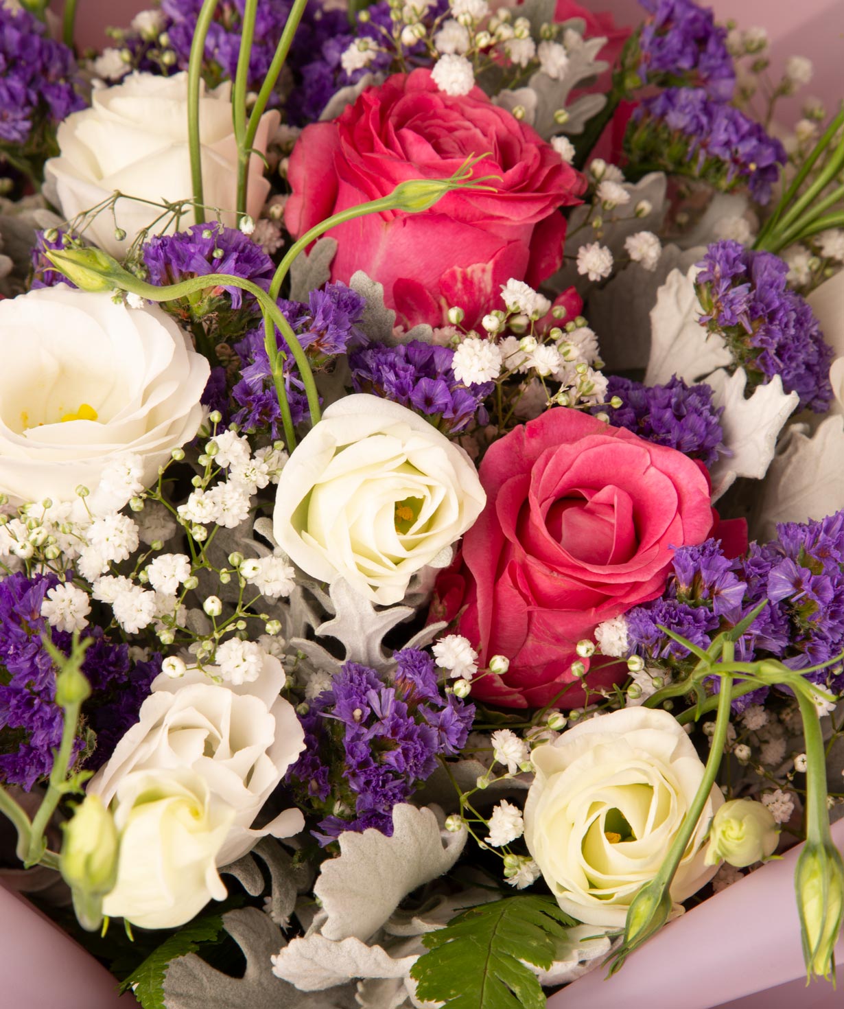 Bouquet `Lubon` with gypsophila, roses, lisianthus and limoniums
