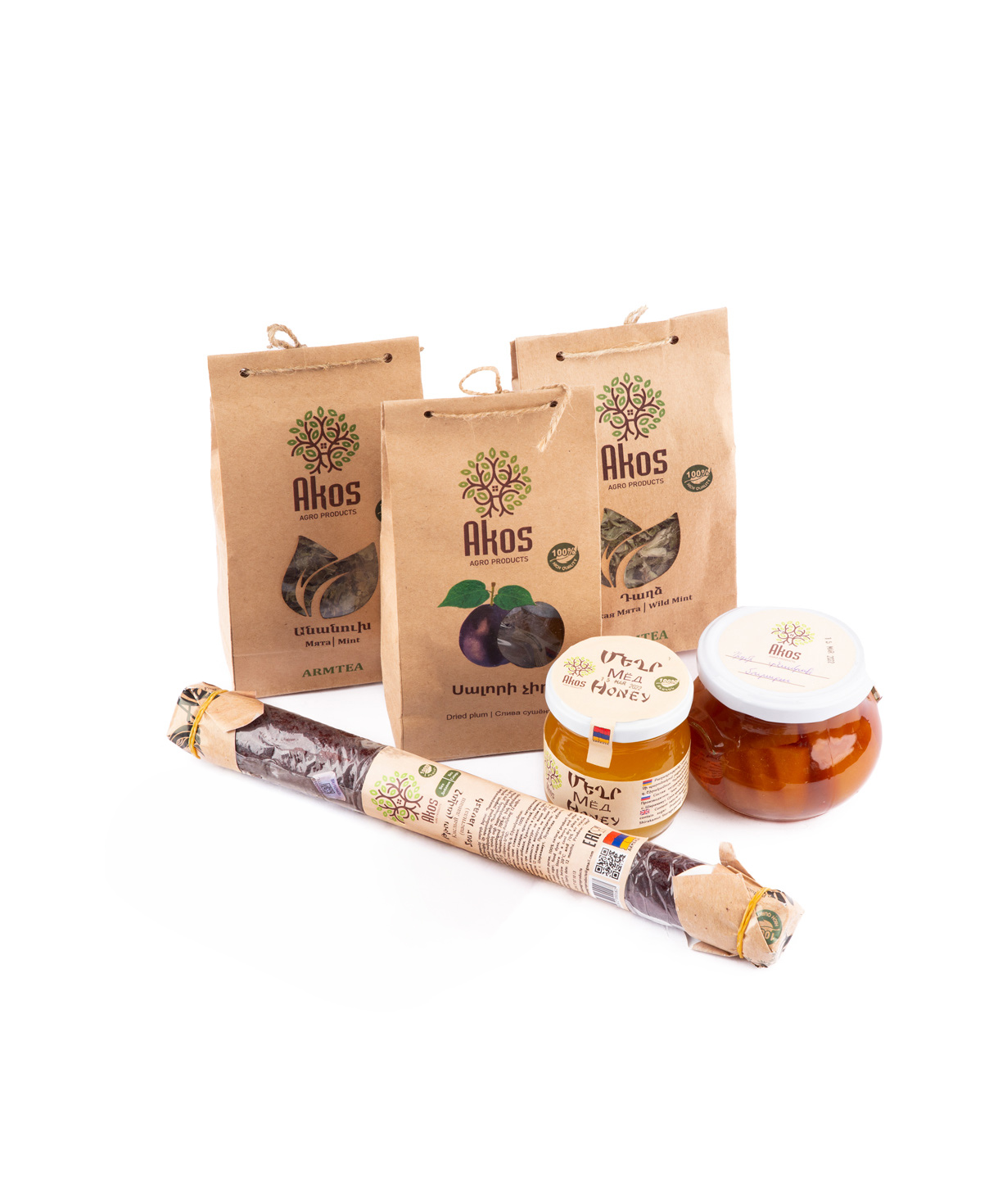 Basket `Akos` with tea, fruit pastille, dried fruit and  jam