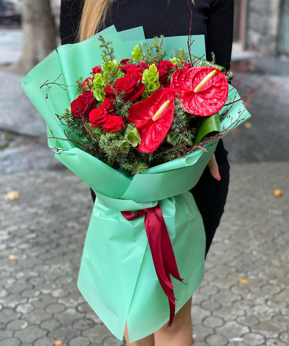 Bouquet `Kripan` with roses and anthuriums
