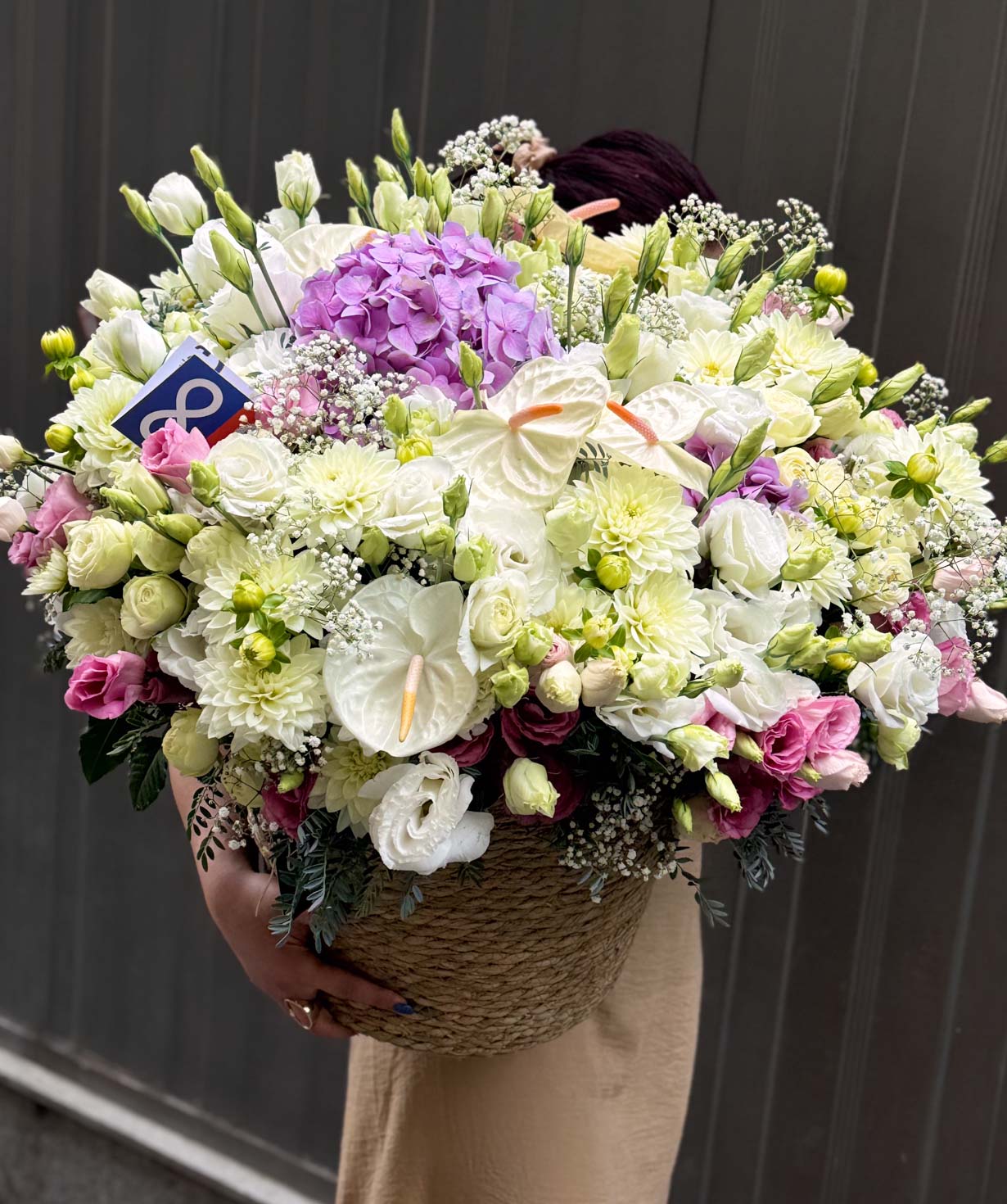 Composition «Hvidovre» with anthurium and spray roses