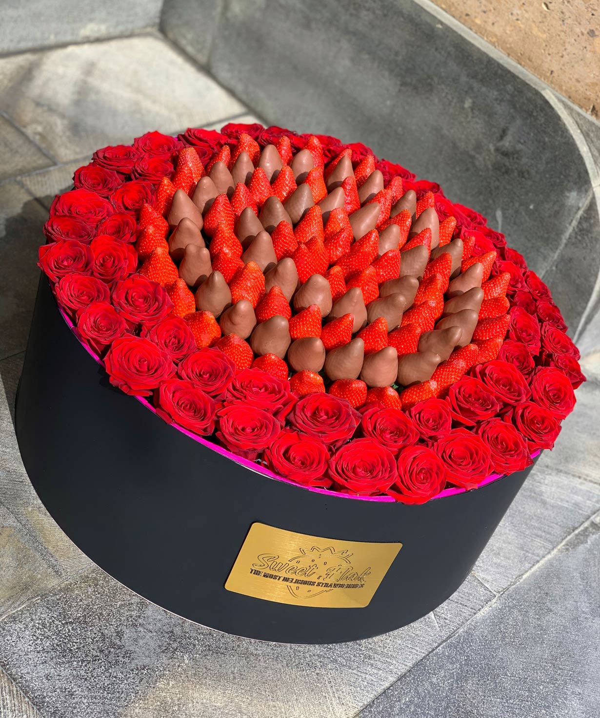 Composition `Sweet Elak` with strawberries and roses