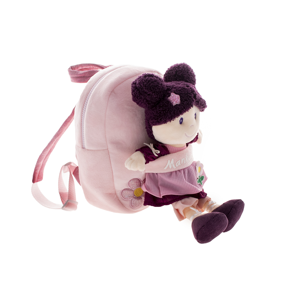 Soft doll with backpack