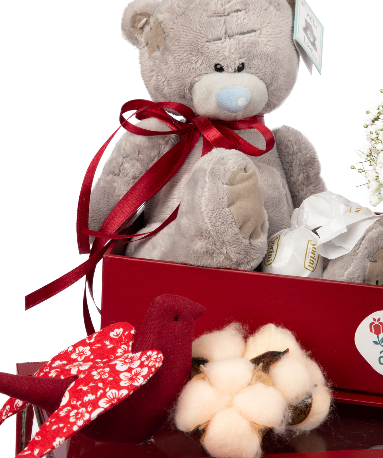 Arrangement `Priva` with flowers, sweets and soft bear