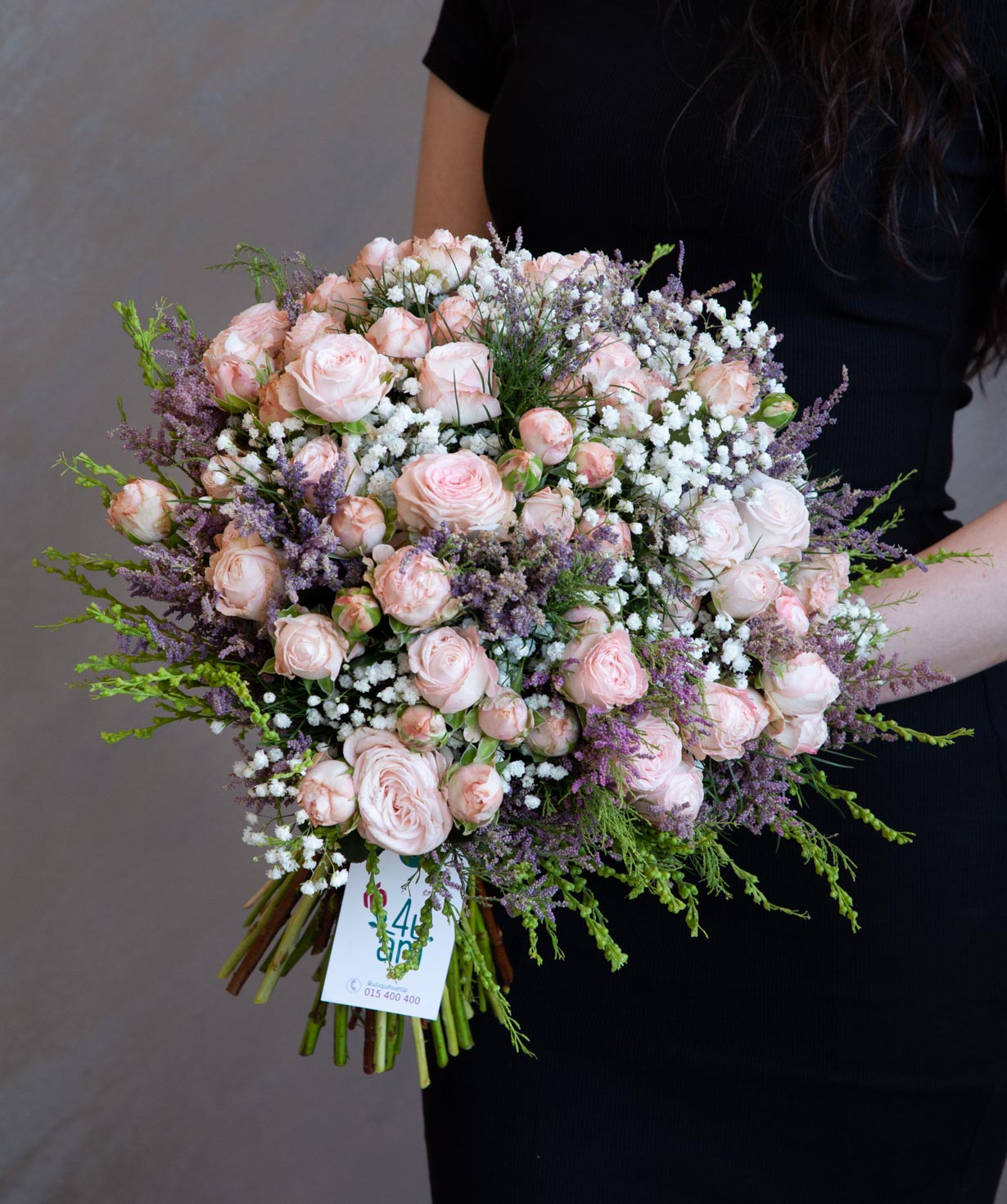 Bouquet `Orlando` with roses and gypsophila