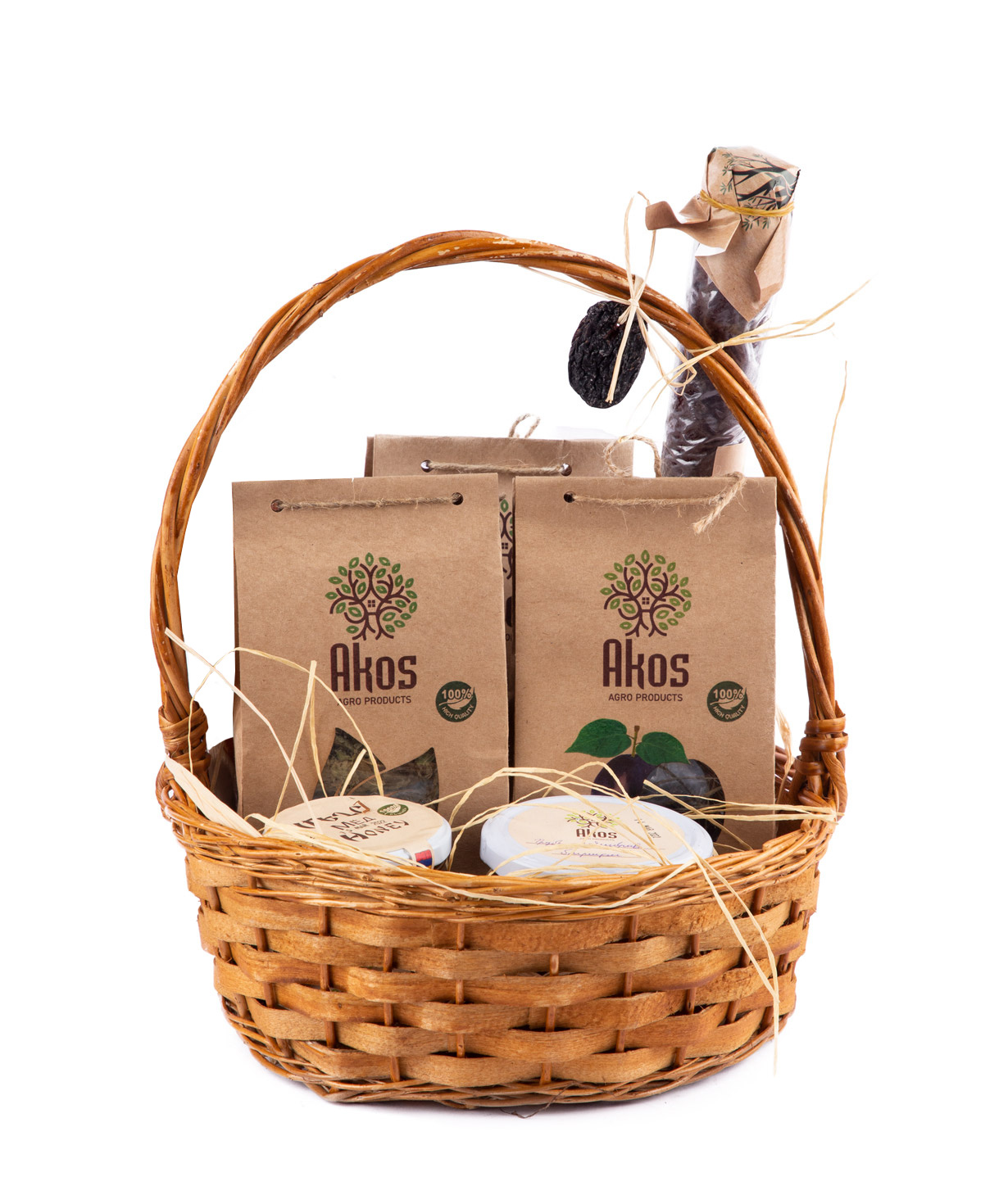 Basket `Akos` with tea, fruit pastille, dried fruit and  jam