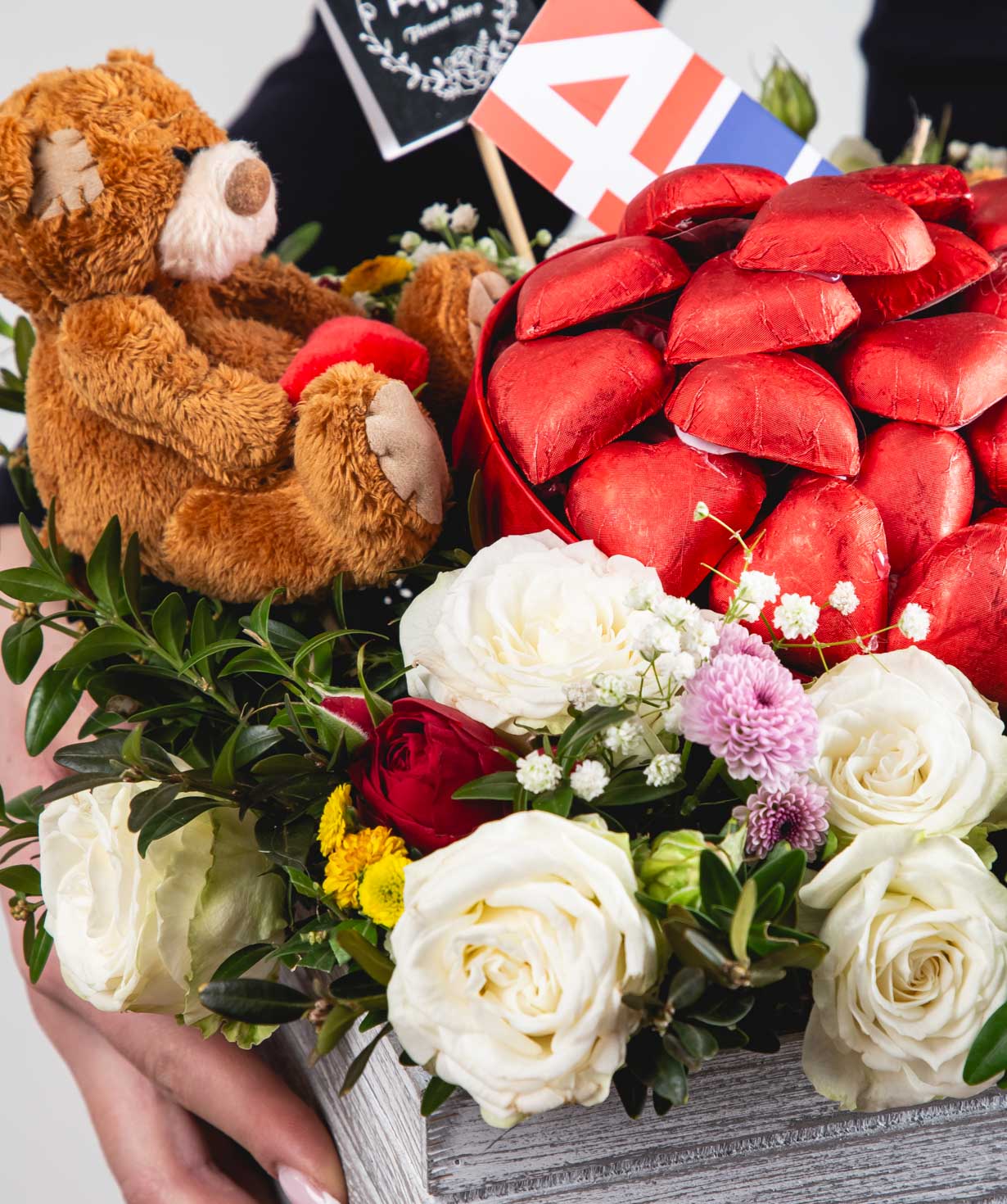 Composition «Malpelo» with spray roses and candies