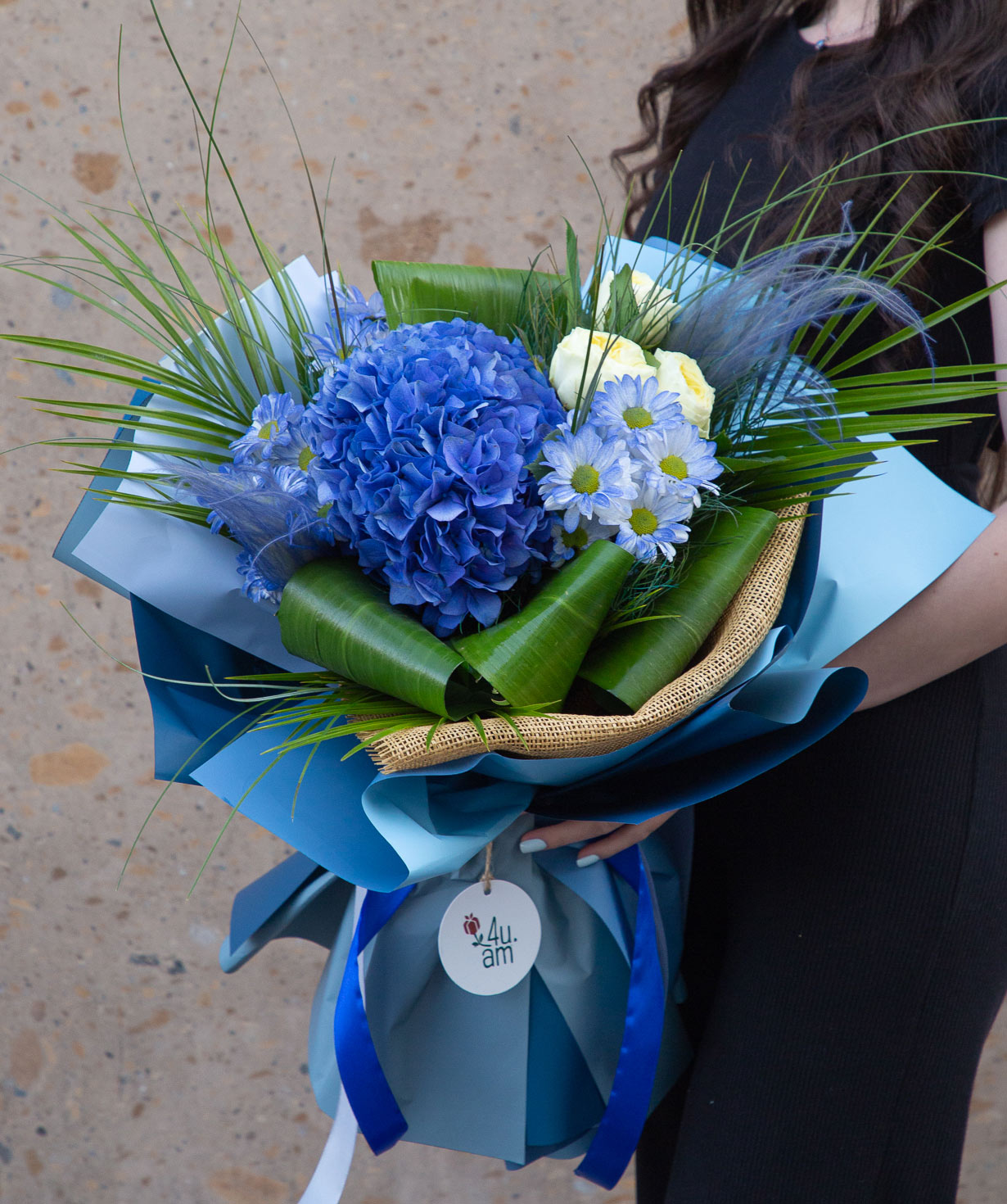 Bouquet `Kandy` with hydrangeas, roses and chrysanthemums