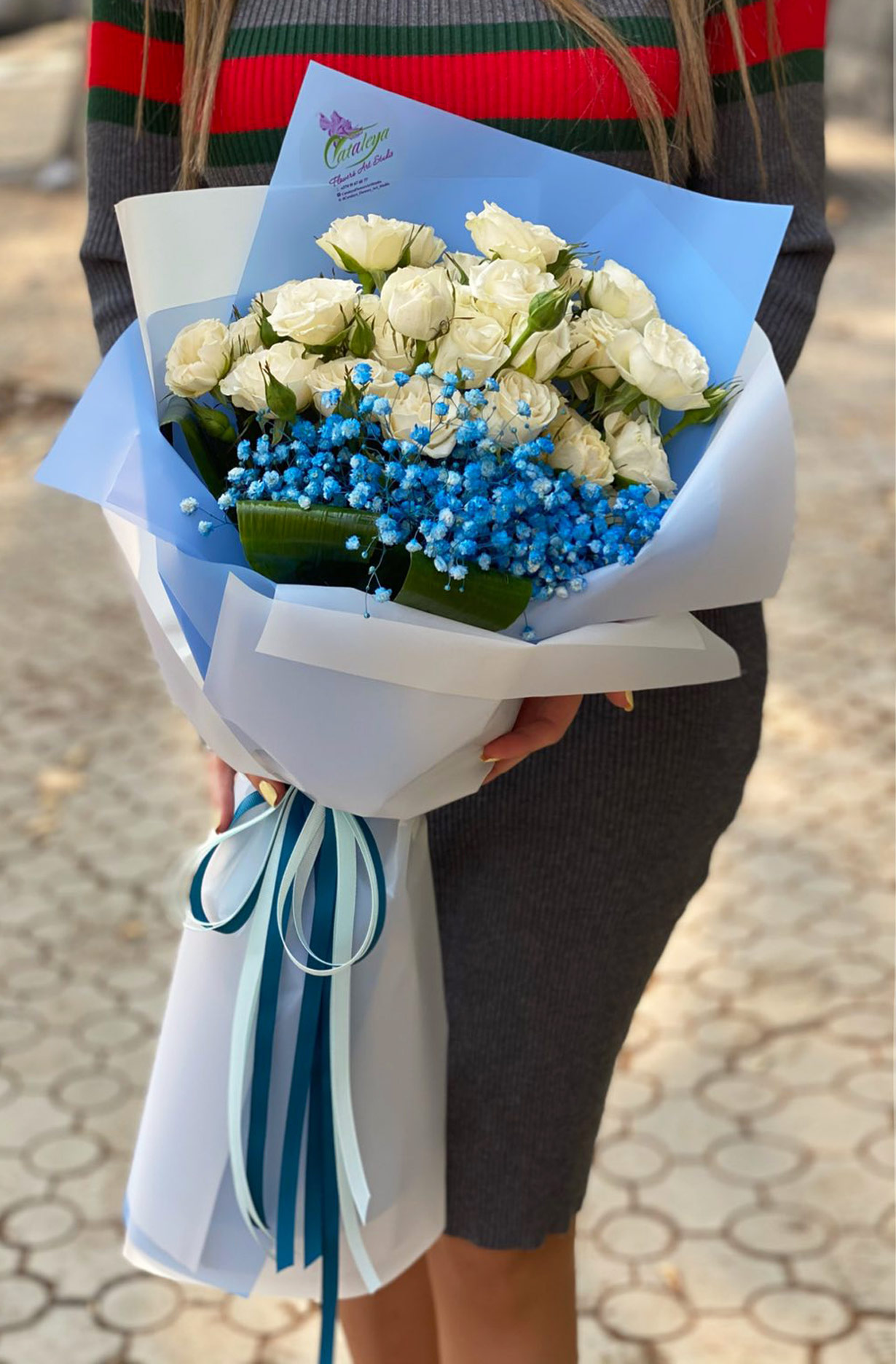 Bouquet `Salonik` with roses and gypsophilia