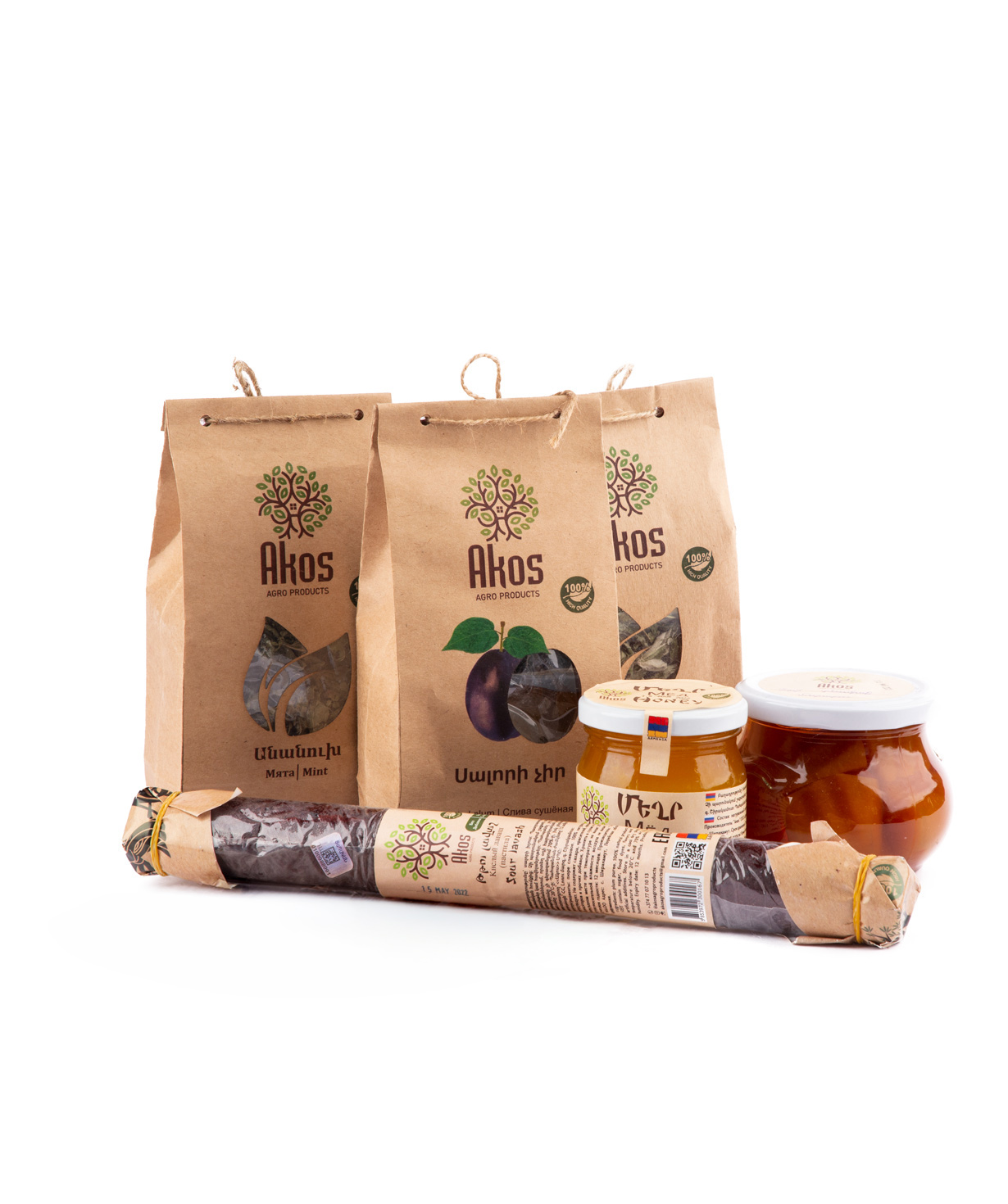 Basket `Akos` with tea, fruit pastille, dried fruit and  jam