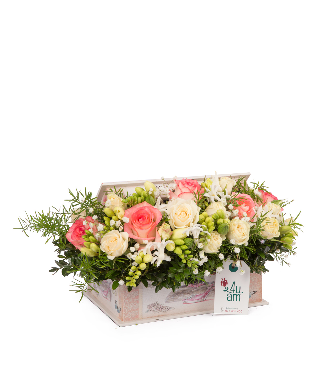 Composition `Varena` with roses and freesias